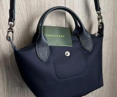 Sac longchamp mini 18$
